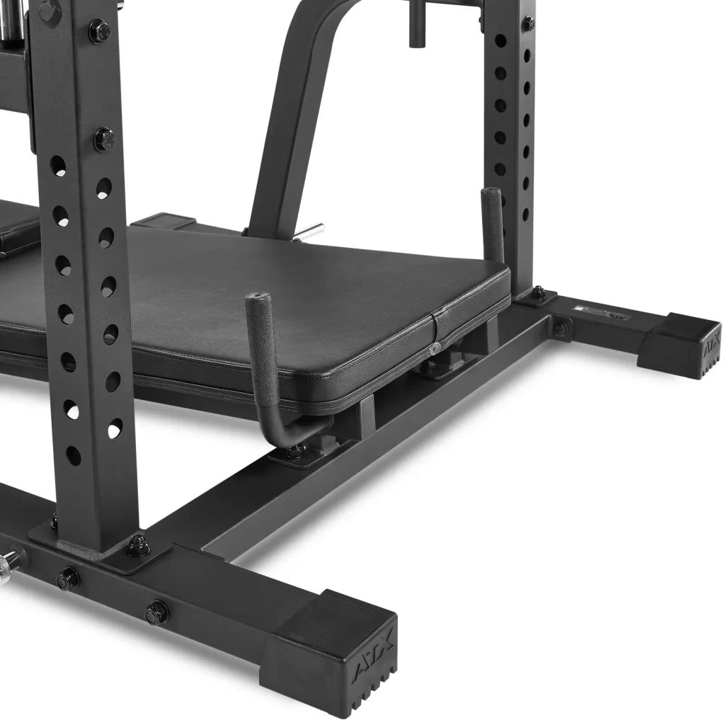 Close-up of a black adjustable weight bench with a sturdy metal frame and cushioned seat. The bench has multiple slots for varying height adjustments, ideal for strength training. The base has rubber feet for stability.