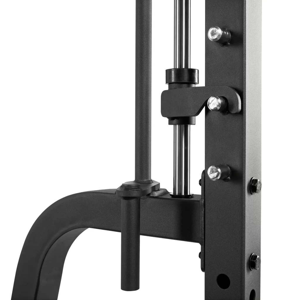 Close-up of a black and silver metal gym equipment frame with visible screws and rods, showcasing part of its structural design.