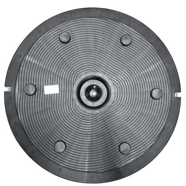 The Power Maxx Bosu Ball is a black circular rubber mat with concentric ridges, six evenly spaced raised bumps, and a central metal hub, likely designed for stability or grip.