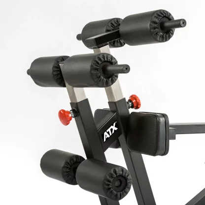 Close-up of ATX Torso Trainer padded rollers and red adjustment knobs for secure ab and back training