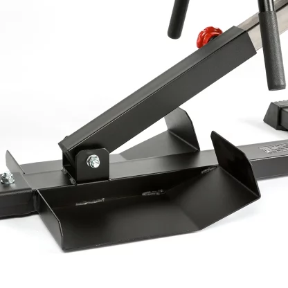 Close-up of ATX Torso Trainer footrest with adjustable mechanism and red knob for hyperextension exercises